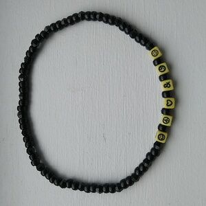 Black Beaded Necklace with Yellow Emoji Beads
